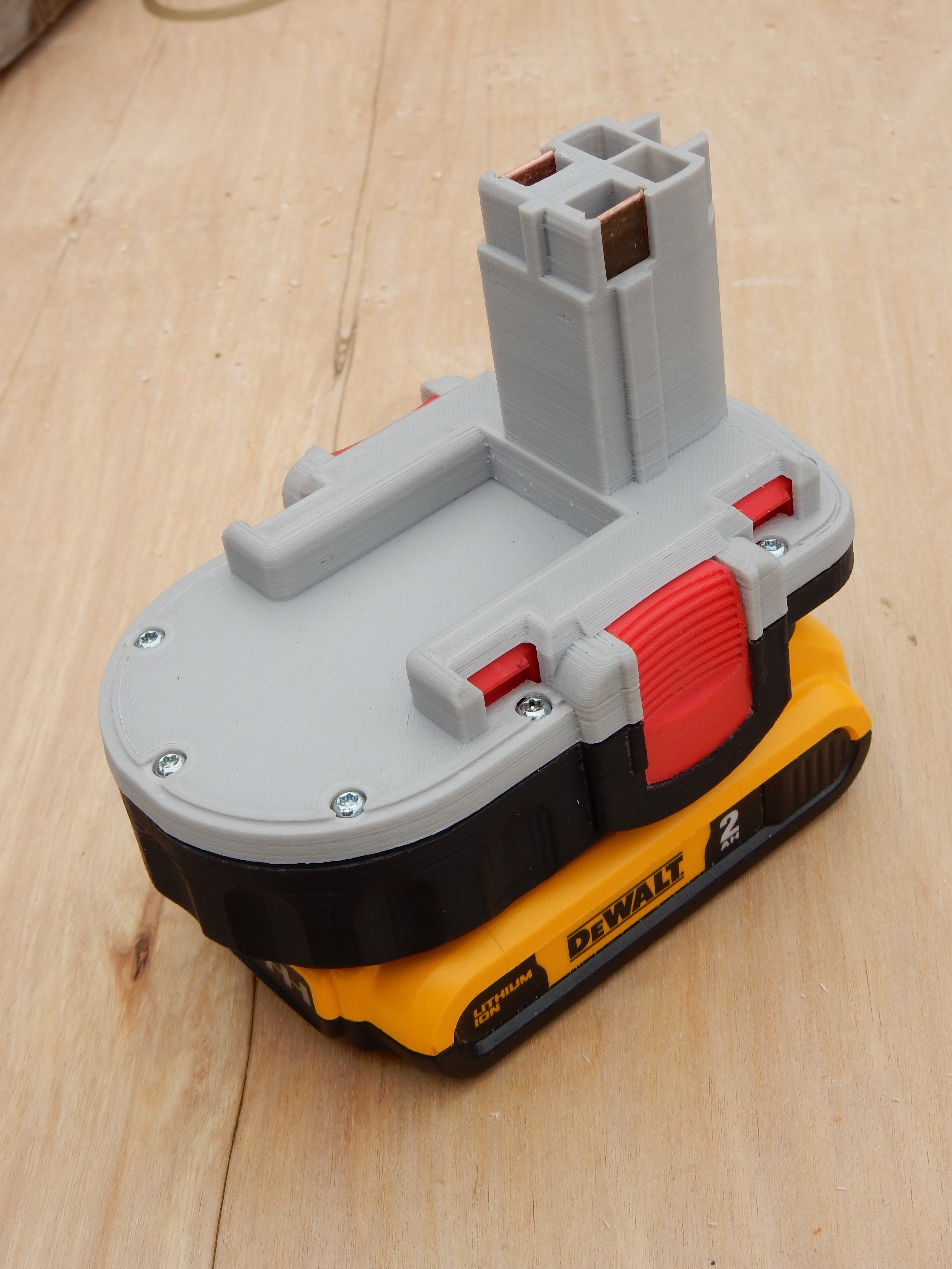 thumbnail image 2 of Battery Adapter – Use Bosch 18V Lithium Battery With Dewalt 18V Ni-Cd Power Tools (DEMKMILRI) 2 of 4