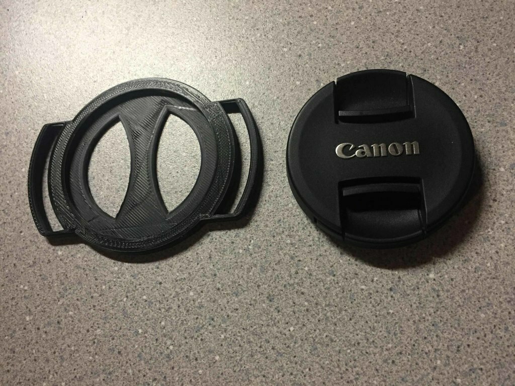 Free 3D file 58mm Strap Mount Lens Cap Holder 🧢 ・3D printing template