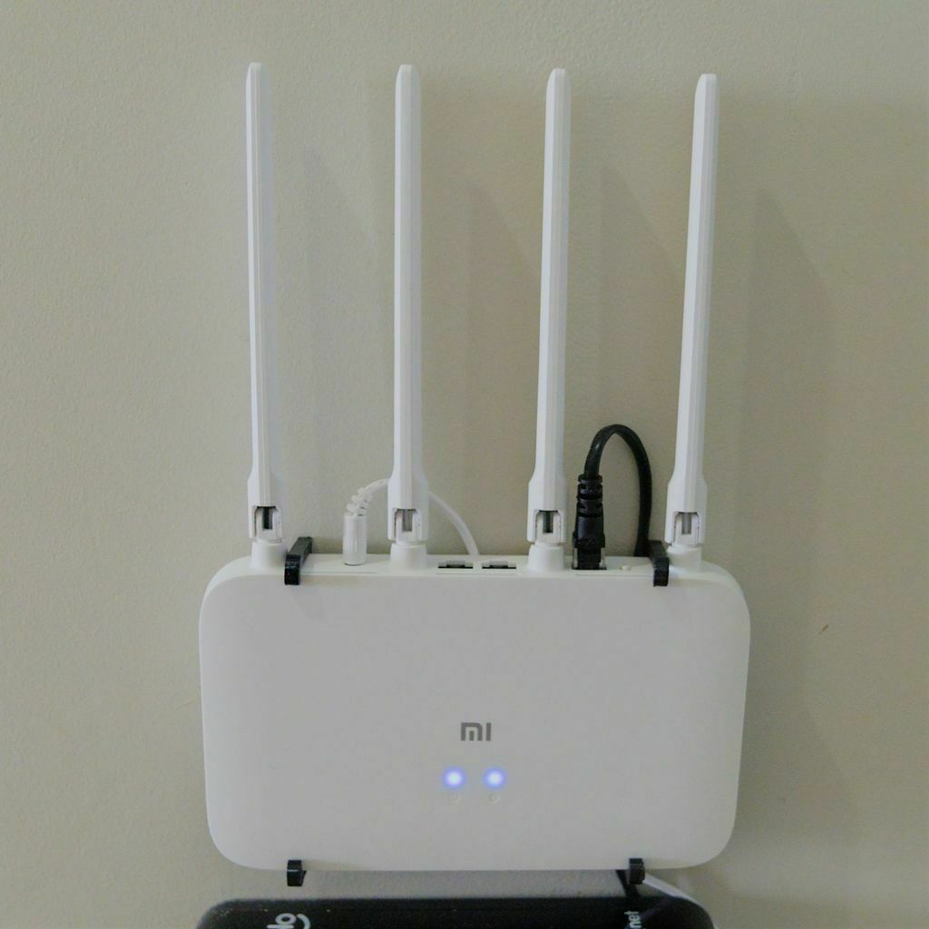 Free 3D file Xiaomi Router 4A Gigabit Version Wall Mount 🖥️・3D printing ...